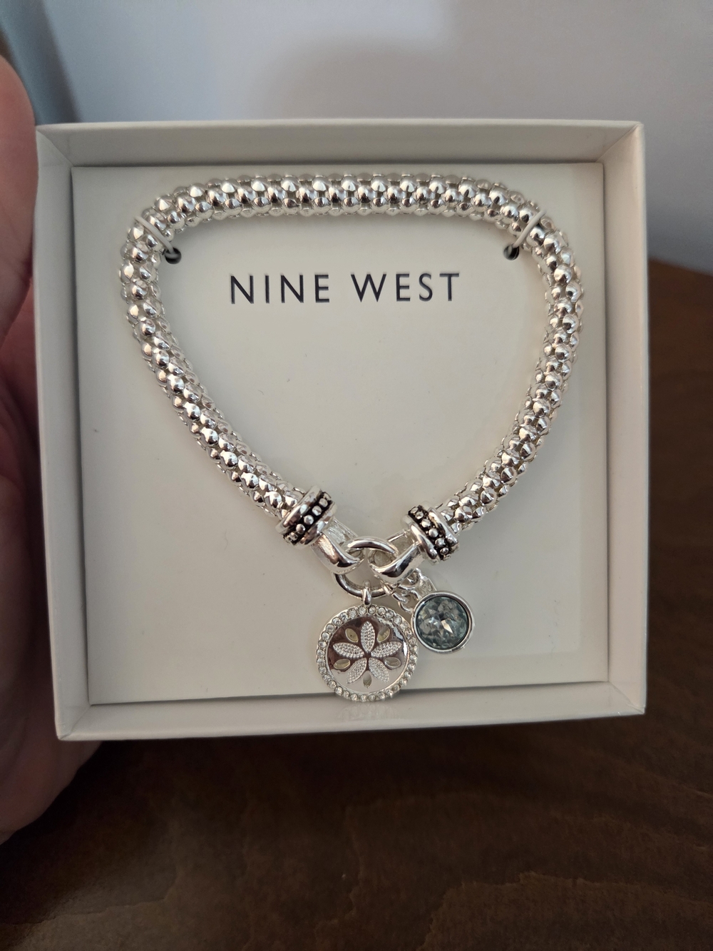 Nine West Silver Tone Beaded Bracelet with Blue Crystal and Floral Charm
